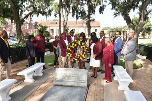 Students at a wreath laying ceremony