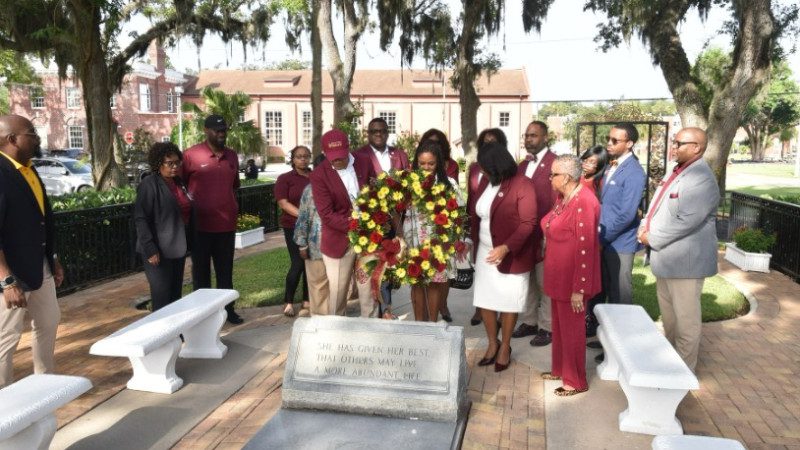 Students at a wreath laying ceremony