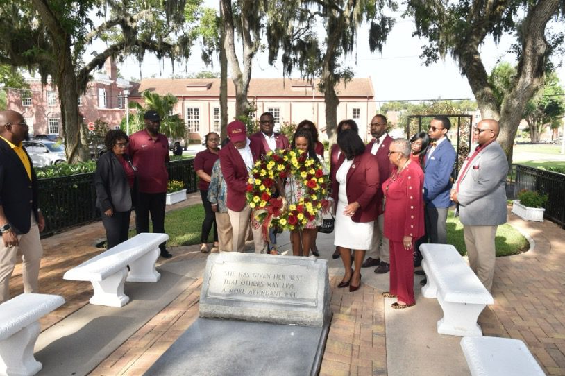 Students at a wreath laying ceremony