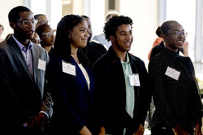 Interns listen as Governor Charlie Baker speaks at the UNCF Lighted Pathways/Ernest E. Just Partners Reception