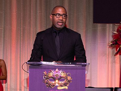 A person speaking at a podium