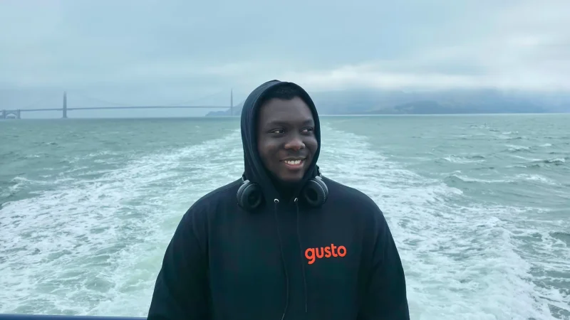Praise Olaiya in front of the bay