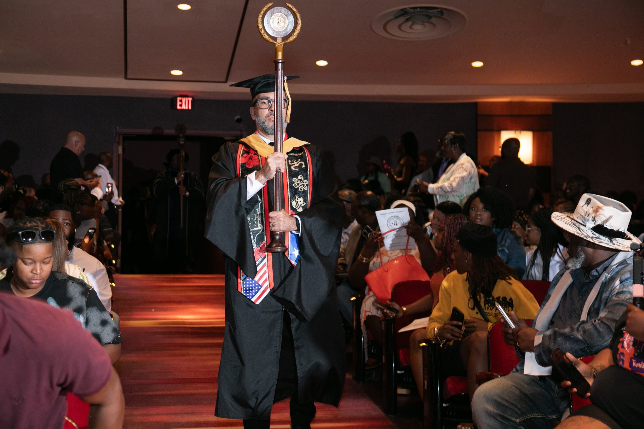 Man holding ceremonial object