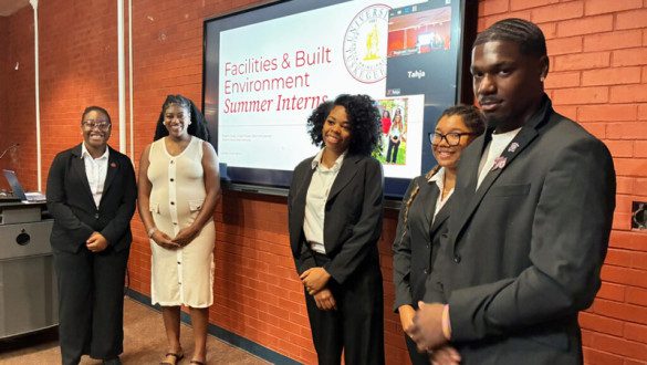 Summer interns making presentation at Capstone