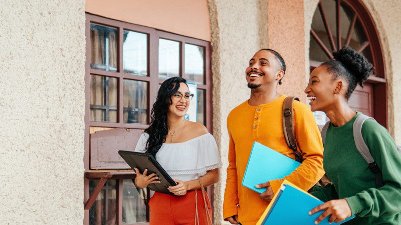 Getty image of students walking with books
