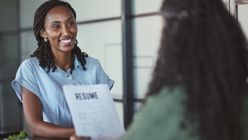 Happy Black Female Candidate Smiling Confidently During Interview