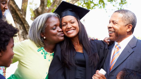 Photo of a girl celebrating graduation with her family