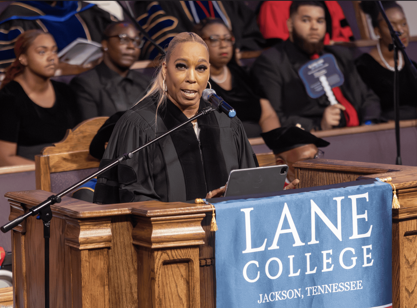 A speaker at the podium at Lane College's 2026 commencement