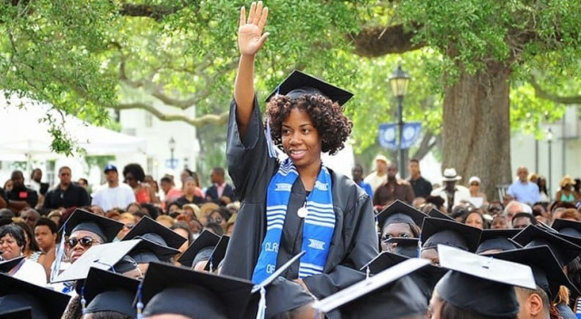 Woman at Graduation waving