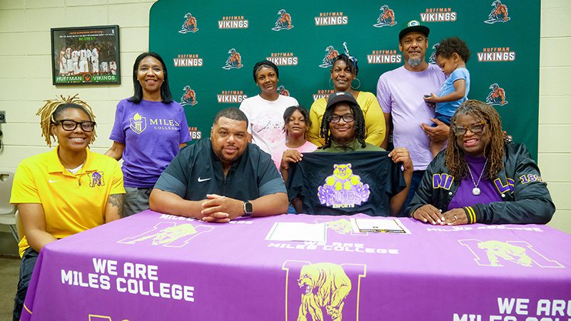 Miles College eSports reps at a table