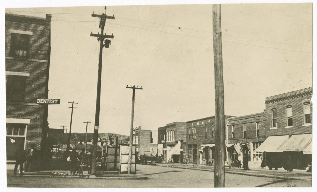 The Greenwood District before it was destroyed in the Tulsa Race Massacre. The area, known as “Black Wall Street,” was a thriving self-sufficient local economy with hundreds of Black-owned businesses. Photo from the Smithsonian National Museum of African American History and Culture, Gift of the Families of Anita Williams Christopher and David Owen Williams.