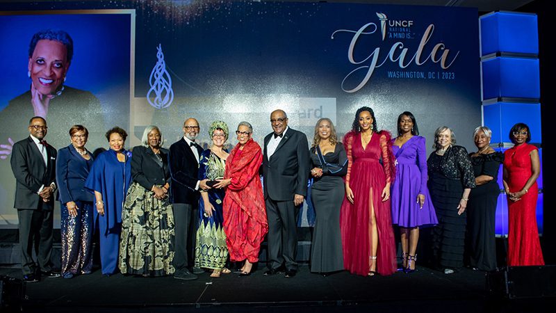 National Gala event leaders and honorees stand together onstage