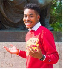 A man in a Tuskegee University sweater