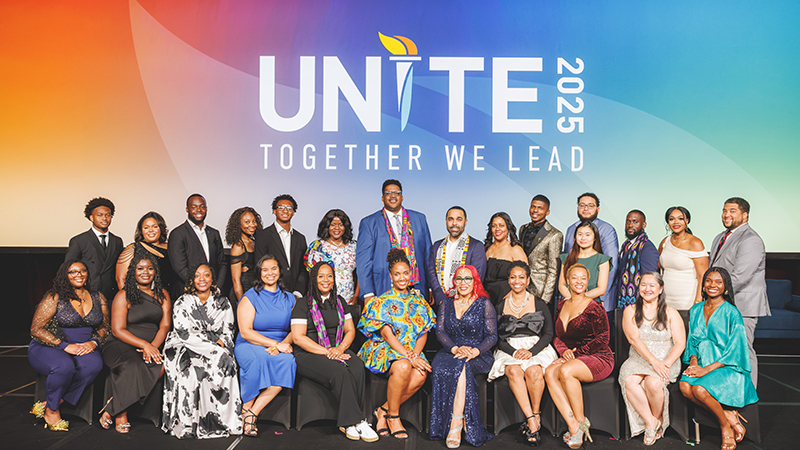 Members of UNCF’s Institute for Capacity Building pose for a group photo on the main stage at UNITE 2025 in Atlanta, Georgia.