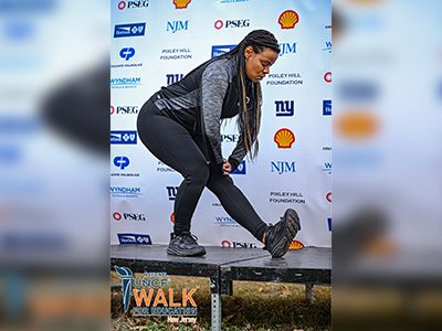 woman stretching onstage