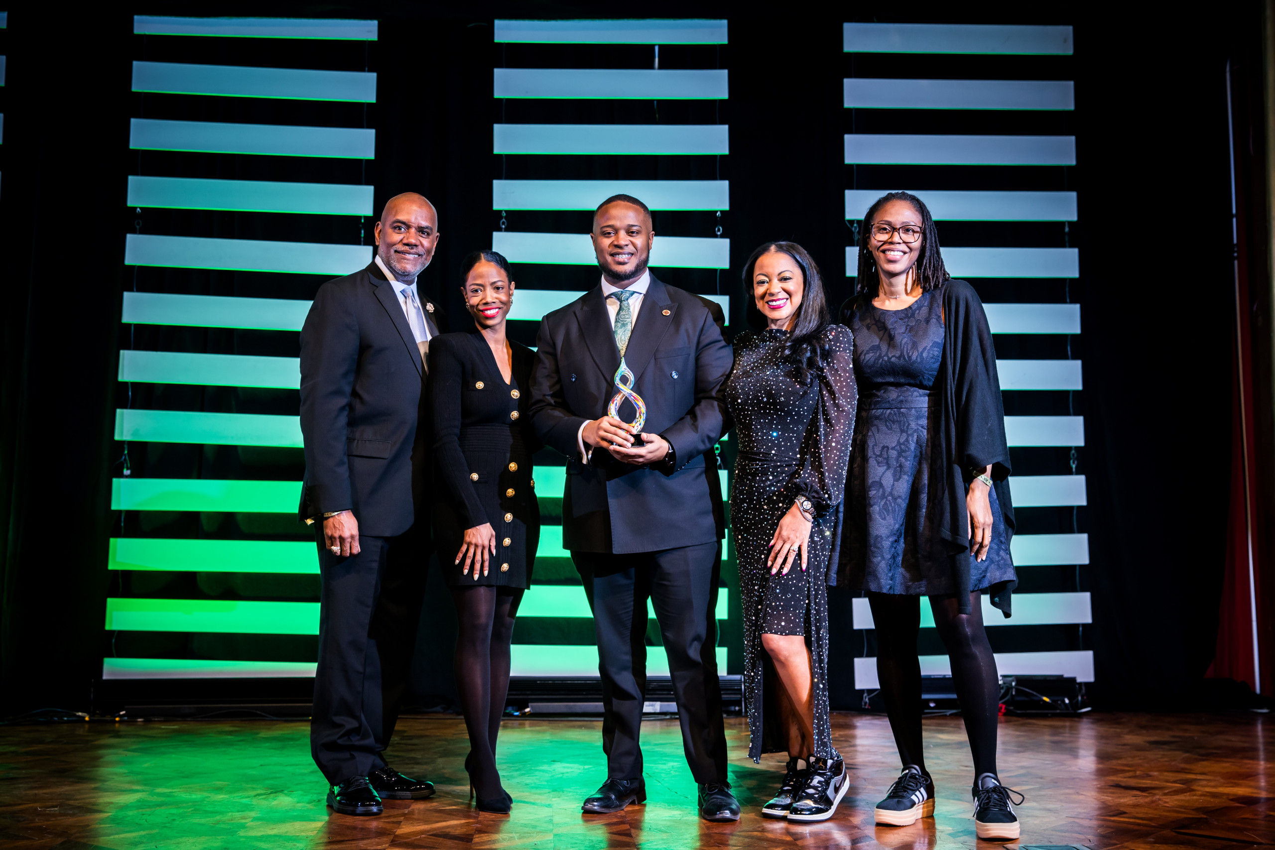 Group of event attendees on stage