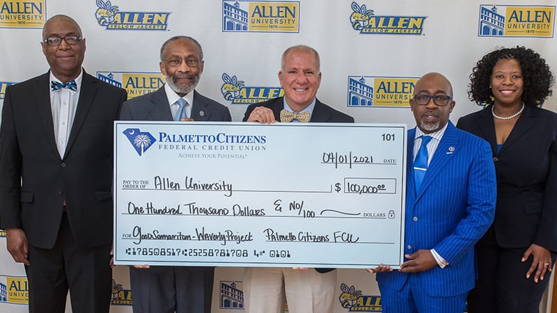 A group of Allen University officals recieve a $100,000 donation from Palmetto Federal Credit Union