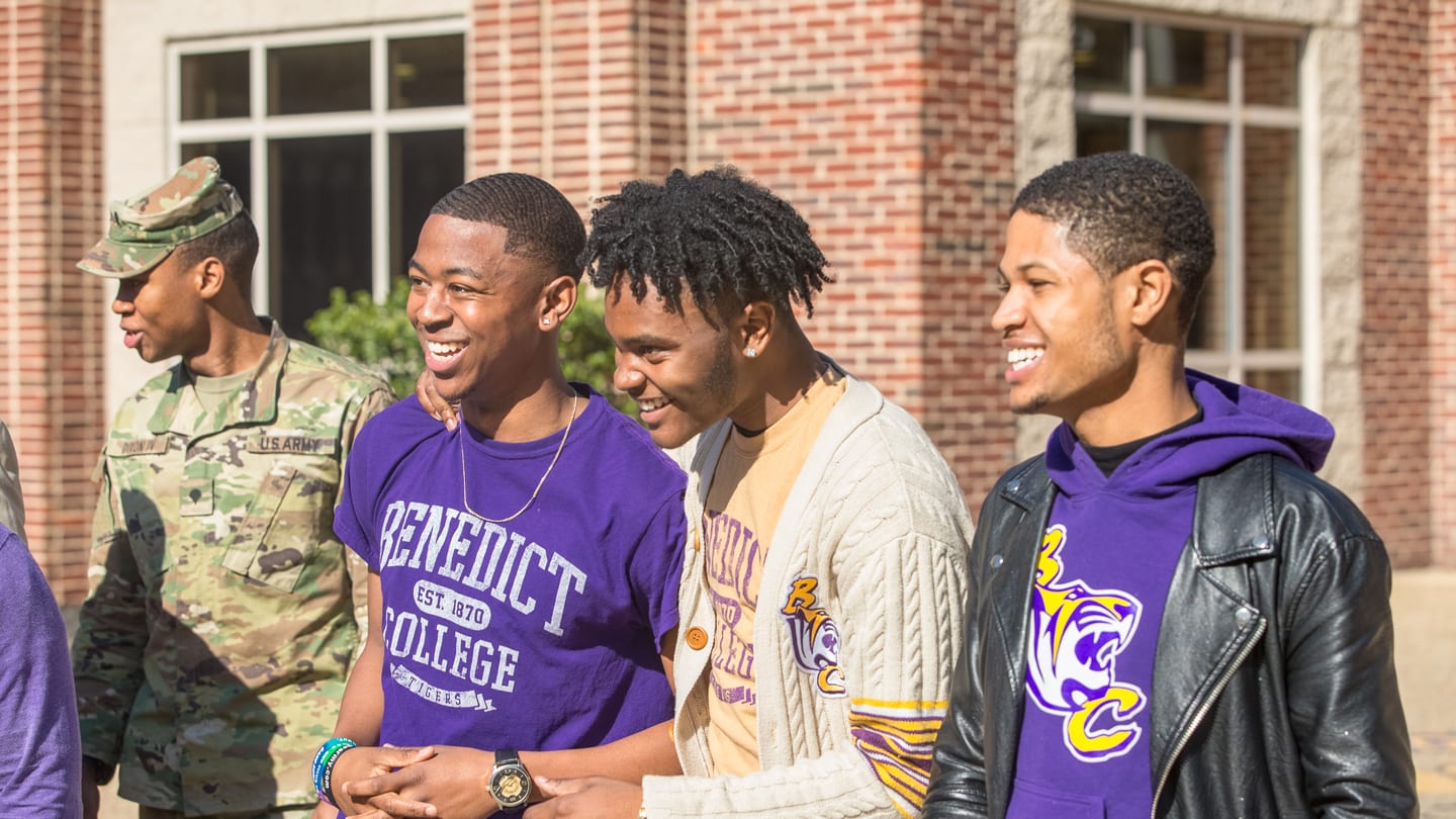4 male students outdoors at Benedict College campus
