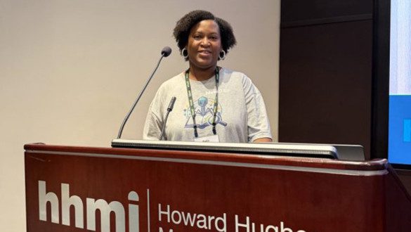 Najla Norwood at a podium