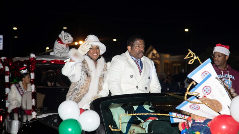 Billy Hawkins and Wife riding during Christmas parade in Talladega