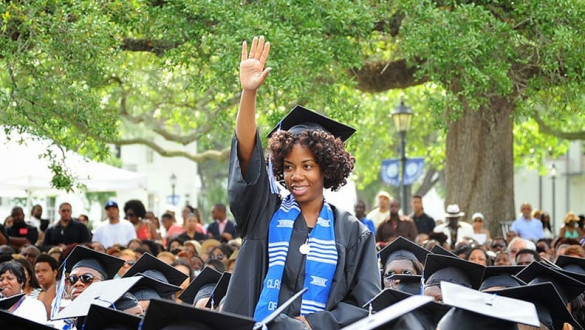 Group of graduates of Dillard University in caps and gowns