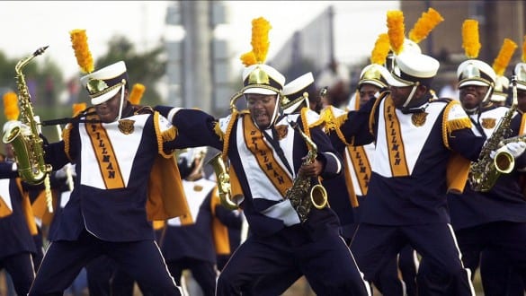 Stillman College marching band members performing during football game