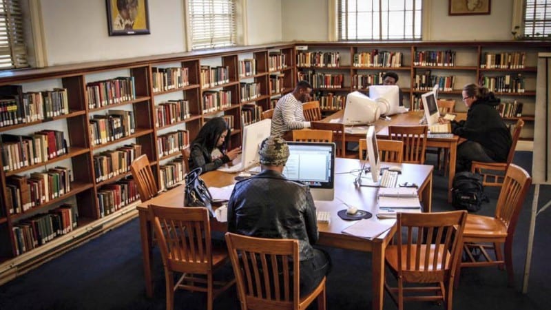 Group of Stillman College students studying in library