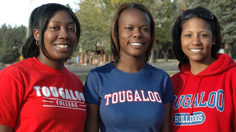 Group shot of 3 Tougaloo College girls smiling