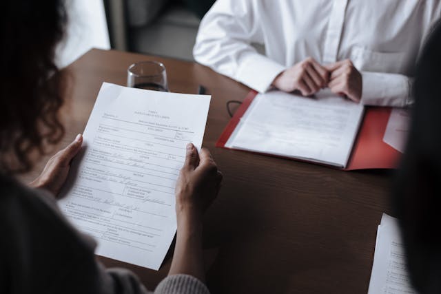 Job interview with papers in hands