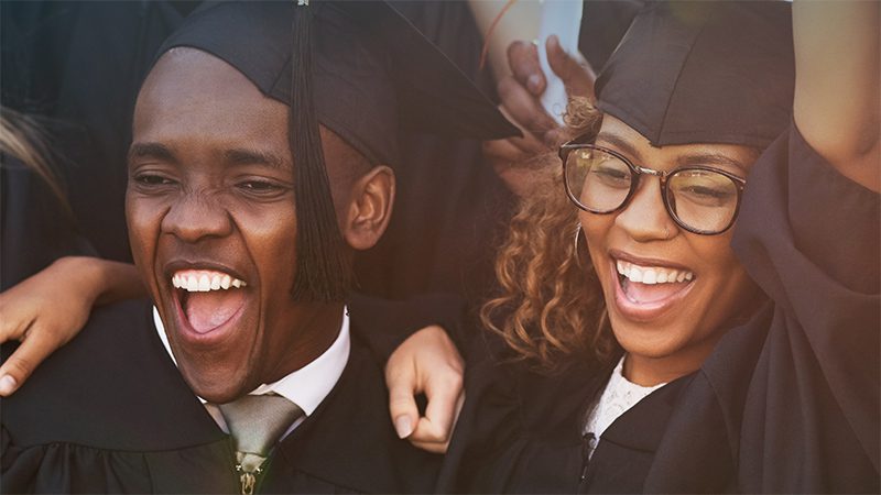 closeup of happy graduates