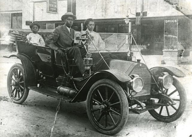 The Williams family were prominent entrepreneurs in the Greenwood District, owning several businesses including the Dreamland Theatre. John Wesley Williams, his wife Loula Williams and their son William Danforth Williams in their 1911 Norwalk automobile. Photo from the Tulsa Historical Society & Museum.